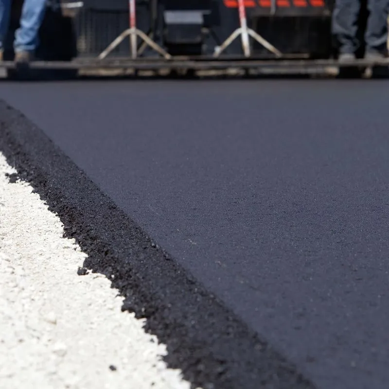 Asphalt being installed for a new driveway